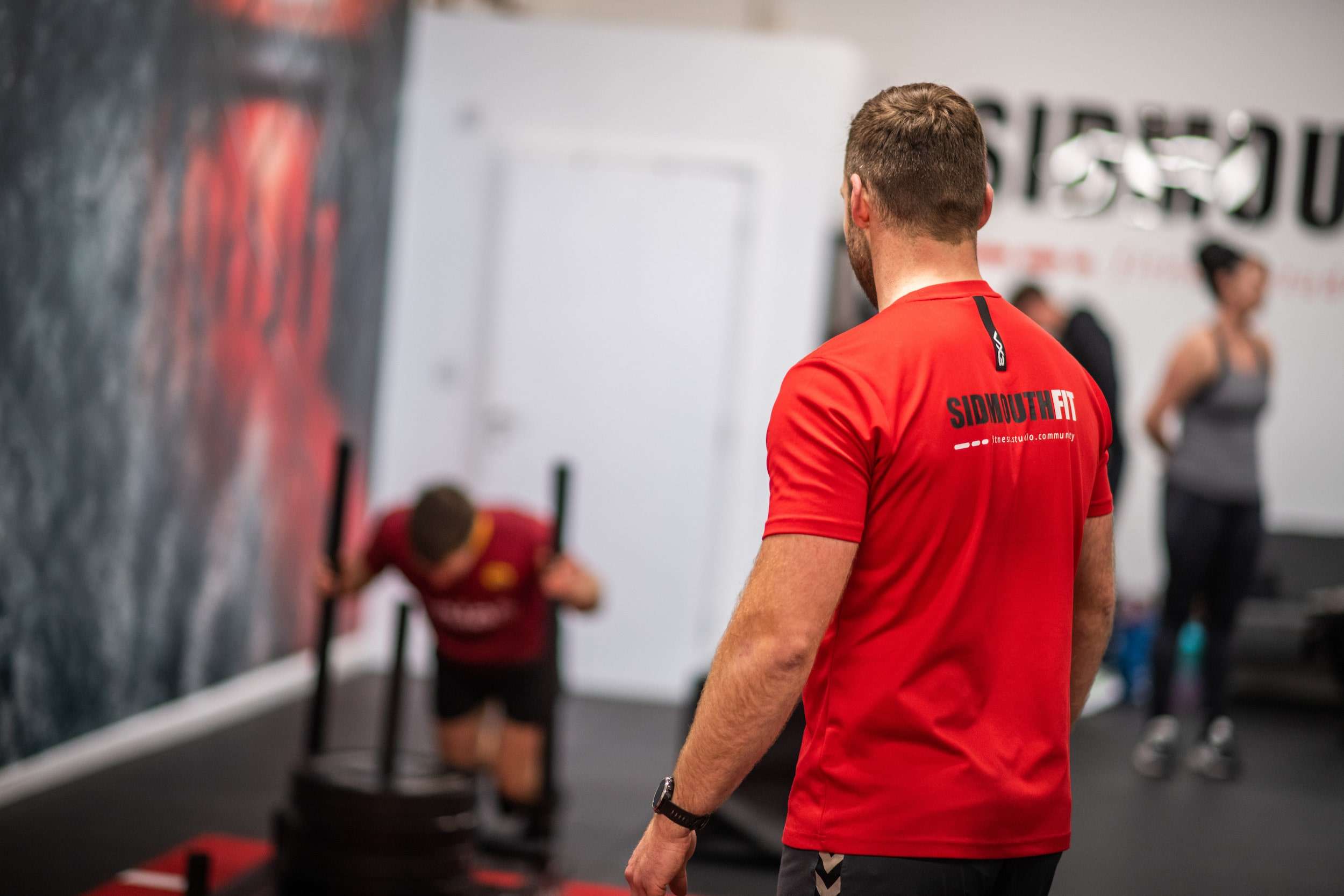 Coaching and Working out in the gym.